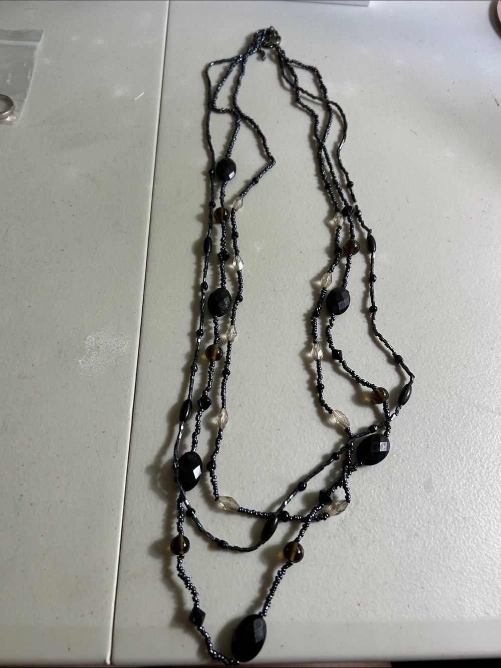 Multi-Strand Black and Brown Beaded Necklace